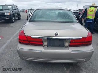 2004 Mercury Grand Marquis LS Premium with VIN 2MEFM75W44X604564, listed as a IAAI auction lot 41740462 with 119,693 mi miles. Bid and sale history available at carsss.com. Image 17.
