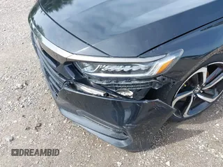 2020 Honda Accord Sport z VIN 1HGCV2F31LA001878, wystawiony jako IAAI lot #42274736 z przebiegiem Nie podano mil oraz . Historia ofert i sprzedaży dostępna na DreamBid. Obrazek 14.