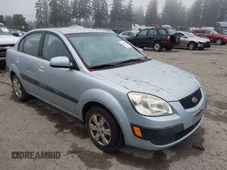 2008 Kia Rio LX with VIN KNADE123086389437, listed as a IAAI auction lot 41322555 with 102,704 mi miles. Bid and sale history available at carsss.com. Image 1.