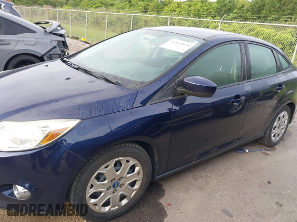 2012 Ford Focus SE z VIN 1FAHP3F24CL102600, wystawiony jako IAAI lot #42169855 z przebiegiem 91 905 mil mil oraz . Historia ofert i sprzedaży dostępna na DreamBid. Obrazek 14.