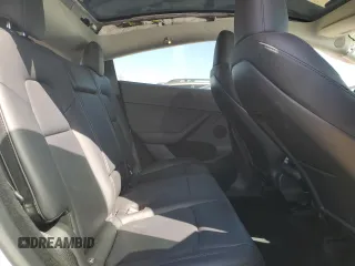 2024 Tesla Model Y Long Range with VIN 7SAYGDEE0RF081948, listed as a Copart auction lot 52612805 with 12,099 mi miles and Salvage Title. Bid and sale history available at DreamBid. Image 10.