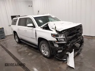 2020 Chevrolet Suburban LT with VIN 1GNSKHKC5LR108971, listed as a IAAI auction lot 41651417 with 90,674 mi miles. Bid and sale history available at carsss.com. Image 1.