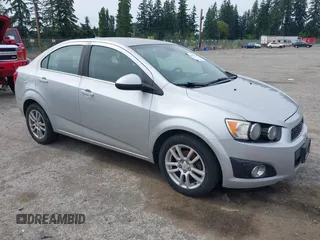 2012 Chevrolet Sonic LT with VIN 1G1JC5SH2C4107858, listed as a IAAI auction lot 42594149 with 150,207 mi miles and . Bid and sale history available at DreamBid. Image 1.
