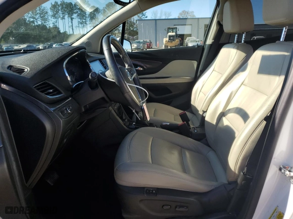 2018 Buick Encore Essence with VIN KL4CJCSBXJB645684, listed as a Copart auction lot 84900194 with 65659 miles and Salvage Title. Bid and sale history available at carsss.com. Image 7.