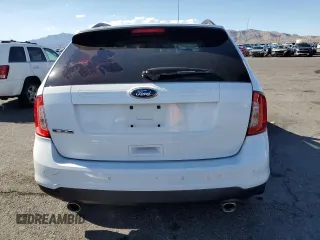 2014 Ford Edge SE z VIN 2FMDK3GC8EBB39954, wystawiony jako Copart lot #56427345 z przebiegiem 139 731 mil mil oraz Szkoda całkowita • Salvage title. Historia ofert i sprzedaży dostępna na DreamBid. Obrazek 6.