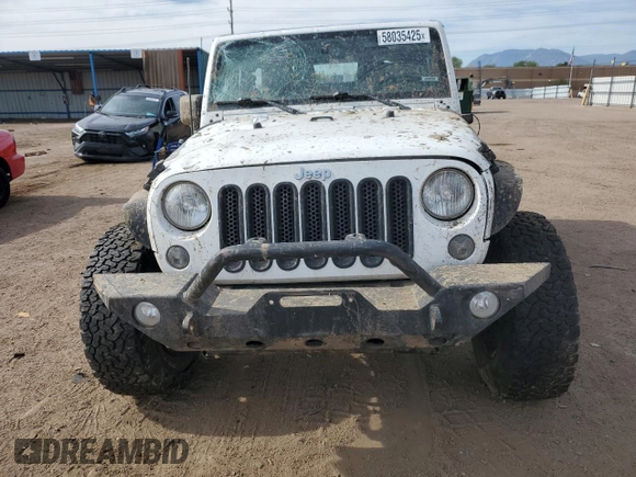 2016 Jeep Wrangler Willys Wheeler z VIN 1C4AJWAG4GL243285, wystawiony jako Copart lot #58035425 z przebiegiem 100 251 mil mil oraz Szkoda całkowita • Salvage title. Historia ofert i sprzedaży dostępna na DreamBid. Obrazek 5.