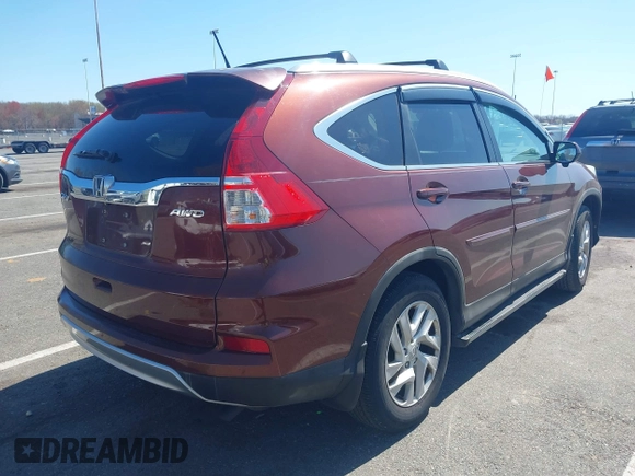 2015 Honda CR-V EX-L with VIN 2HKRM4H74FH616400, listed as a IAAI auction lot 42059162 with 120,636 mi miles and . Bid and sale history available at DreamBid. Image 4.