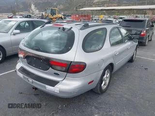 2002 Ford Taurus SE Standard with VIN 1FAFP58U82G227382, listed as a IAAI auction lot 41670977 with 66,354 mi miles. Bid and sale history available at carsss.com. Image 4.