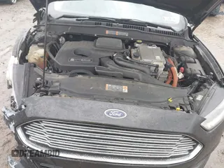 2015 Ford Fusion SE Hybrid with VIN 3FA6P0LU1FR289246, listed as a IAAI auction lot 41733229 with 125,195 mi miles. Bid and sale history available at carsss.com. Image 10.