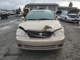 2007 Suzuki Forenza z VIN KL5JD56Z07K657218, wystawiony jako Copart lot #86767854 z przebiegiem 93 044 mil mil oraz Szkoda całkowita • Salvage title. Historia ofert i sprzedaży dostępna na DreamBid. Obrazek 5.