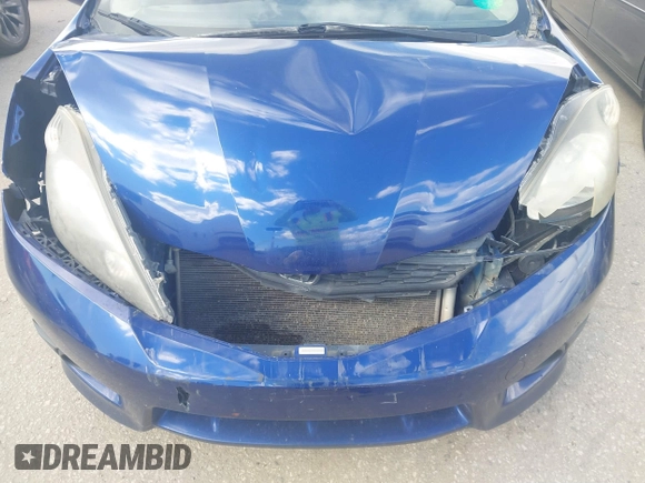 2013 Honda Fit Sport with VIN JHMGE8H50DC052326, listed as a IAAI auction lot 41798913 with 140,894 mi miles. Bid and sale history available at carsss.com. Image 6.