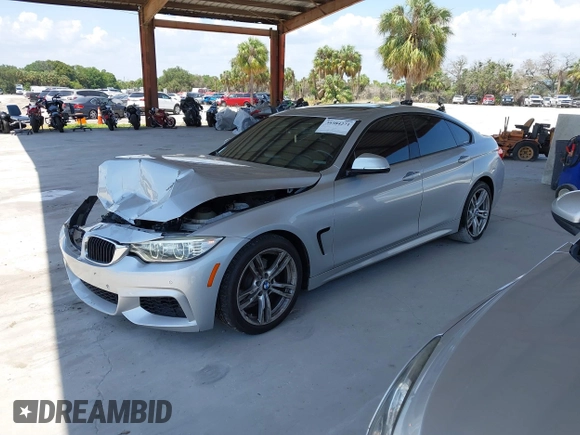 2015 BMW 4 Series 428i with VIN WBA4A5C58FD410076, listed as a IAAI auction lot 39384271 with 125,987 mi miles and . Bid and sale history available at DreamBid. Image 2.