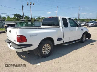 2002 Ford F-150 XL with VIN 1FTRX07W52KB08618, listed as a Copart auction lot 57941974 with 172,843 mi miles and Salvage title. Bid and sale history available at DreamBid. Image 3.