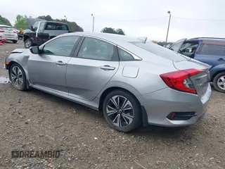 2017 Honda Civic EX-L z VIN 19XFC1F77HE026030, wystawiony jako IAAI lot #42112898 z przebiegiem 73 793 mil mil oraz . Historia ofert i sprzedaży dostępna na DreamBid. Obrazek 3.