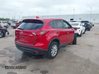 2015 Mazda CX-5 Touring with VIN JM3KE2CY3F0459076, listed as a IAAI auction lot 41913044 with 83,960 mi miles. Bid and sale history available at carsss.com. Image 4.