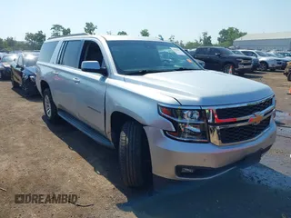 2015 Chevrolet Suburban LT with VIN 1GNSKJKC5FR584200, listed as a IAAI auction lot 42646082 with 227,738 mi miles and . Bid and sale history available at DreamBid. Image 1.