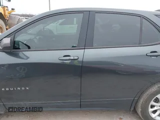 2018 Chevrolet Equinox LS with VIN 3GNAXHEV7JS640663, listed as a IAAI auction lot 41631256 with 141,224 mi miles and . Bid and sale history available at DreamBid. Image 14.