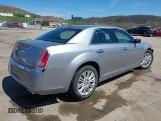 2014 Chrysler 300 C with VIN 2C3CCAKG6EH379114, listed as a IAAI auction lot 41992957 with 151,949 mi miles and . Bid and sale history available at carsss.com. Image 4.