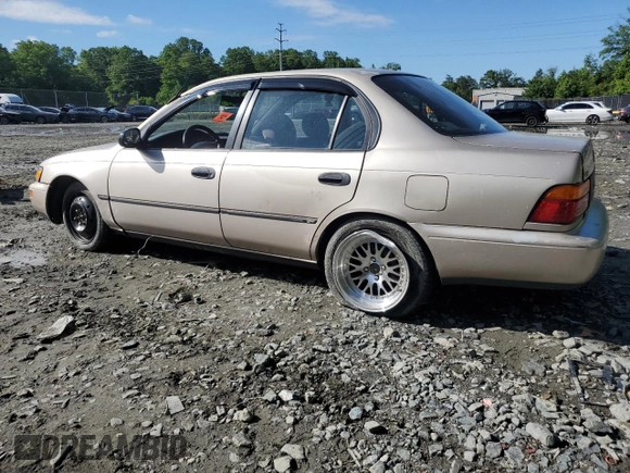 1995 Toyota Corolla DX with VIN 2T1AE09B0SC098739, listed as a Copart auction lot 57653205 with 154,226 mi miles and Salvage title. Bid and sale history available at DreamBid. Image 2.