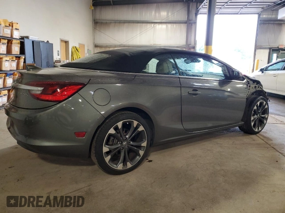 2017 Buick Cascada Premium с VIN W04WH3N59HG117999, выставлен на аукционе Copart как лот 71565694 с пробегом 62 142 миль миль и Списание • Salvage title. История ставок и продаж доступна на DreamBid. Изображение 3.