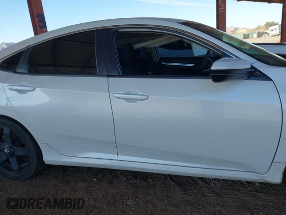 2020 Honda Civic LX with VIN 19XFC2F66LE007328, listed as a IAAI auction lot 41852111 with 135,956 mi miles and . Bid and sale history available at DreamBid. Image 13.