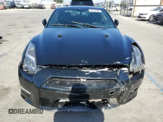 2016 Nissan GT-R Premium z VIN JN1AR5EF8GM290918, wystawiony jako Copart lot #58314455 z przebiegiem 23 667 mil mil oraz Szkody całkowita. Historia ofert i sprzedaży dostępna na DreamBid. Obrazek 5.