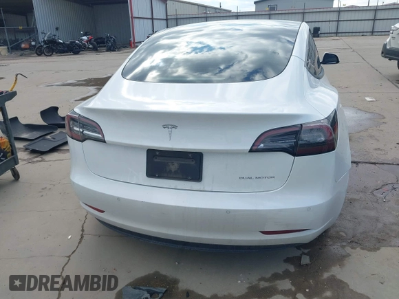 2021 Tesla Model 3 Long Range with VIN 5YJ3E1EB9MF059554, listed as a IAAI auction lot 41231520 with 63,696 mi miles and . Bid and sale history available at DreamBid. Image 15.