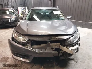 2016 Honda Civic Sedan LX with VIN 2HGFC2F56GH513325, listed as a IAAI auction lot 41972148 with 101,485 mi miles. Bid and sale history available at carsss.com. Image 13.