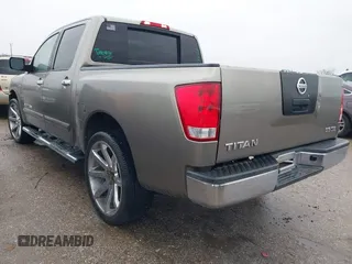 2007 Nissan Titan XE with VIN 1N6BA07A87N219609, listed as a IAAI auction lot 41451297 with 300,263 mi miles. Bid and sale history available at carsss.com. Image 3.