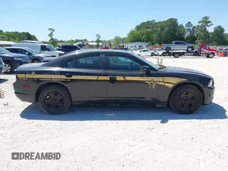 2014 Dodge Charger Police with VIN 2C3CDXAT7EH367018, listed as a IAAI auction lot 42136174 with 191,608 mi miles and . Bid and sale history available at DreamBid. Image 13.