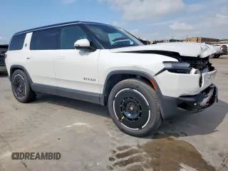 2025 Rivian R1S Adventure z VIN 7PDSGBBA3SN046975, wystawiony jako Copart lot #61790405 z przebiegiem 8 427 mil mil oraz Szkoda całkowita • Salvage title. Historia ofert i sprzedaży dostępna na DreamBid. Obrazek 4.