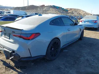 2022 BMW M4 Competition xDrive with VIN WBS43AZ02NCK30252, listed as a IAAI auction lot 41292302 with 44,704 mi miles. Bid and sale history available at carsss.com. Image 4.