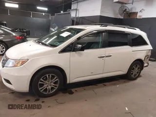 2013 Honda Odyssey EX-L with VIN 5FNRL5H66DB071151, listed as a IAAI auction lot 41914345 with 194,804 mi miles and . Bid and sale history available at carsss.com. Image 14.