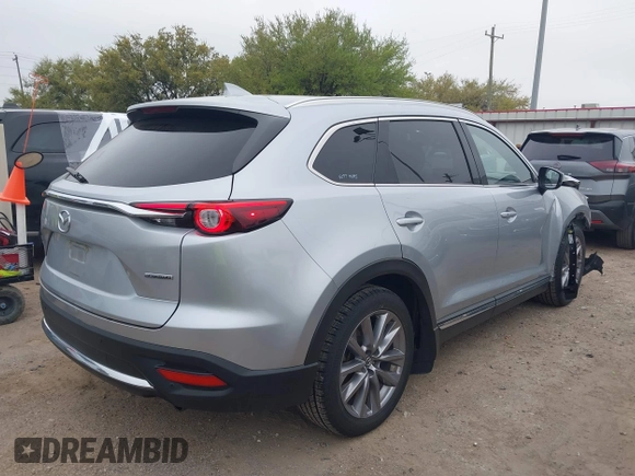 2023 Mazda CX-9 Carbon Edition with VIN JM3TCBDY7P0638506, listed as a IAAI auction lot 41889425 with 60,471 mi miles and . Bid and sale history available at carsss.com. Image 4.