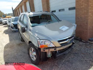2009 Kia Sorento LX with VIN KNDJD735995865882, listed as a IAAI auction lot 41806384 with 1 mi miles. Bid and sale history available at carsss.com. Image 1.