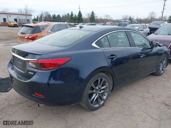 2016 Mazda Mazda6 i Grand Touring with VIN JM1GJ1W57G1486962, listed as a IAAI auction lot 41813471 with 64,078 mi miles. Bid and sale history available at carsss.com. Image 4.