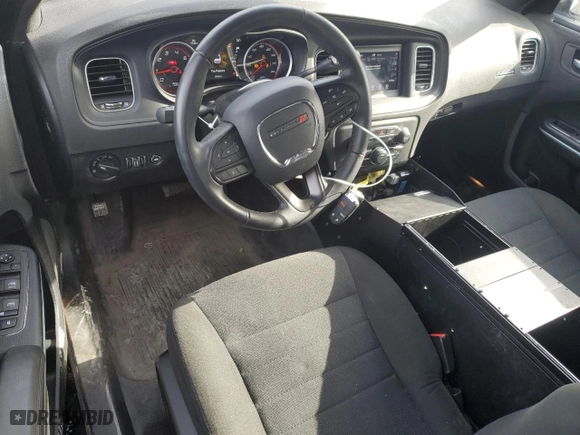2023 Dodge Charger Police with VIN 2C3CDXKG6PH613514, listed as a Copart auction lot 46024455 with 6,910 mi miles and Salvage Title. Bid and sale history available at carsss.com. Image 8.