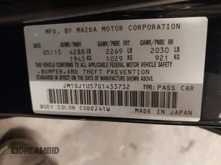 2016 Mazda 6 i Sport with VIN JM1GJ1U57G1433732, listed as a IAAI auction lot 41879844 with 107,269 mi miles and . Bid and sale history available at DreamBid. Image 9.