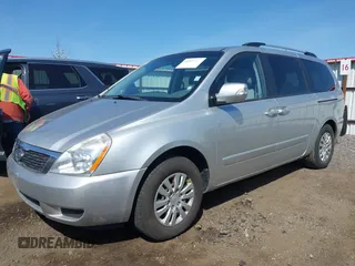 2012 Kia Sedona LX with VIN KNDMG4C70C6491703, listed as a IAAI auction lot 42128411 with 246,586 mi miles. Bid and sale history available at carsss.com. Image 2.