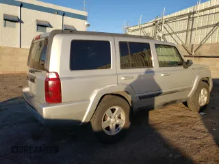 2008 Jeep Commander Sport z VIN 1J8HH48KX8C105432, wystawiony jako Copart lot #86000854 z przebiegiem 201 869 mil mil oraz Szkoda całkowita • Salvage title. Historia ofert i sprzedaży dostępna na DreamBid. Obrazek 3.