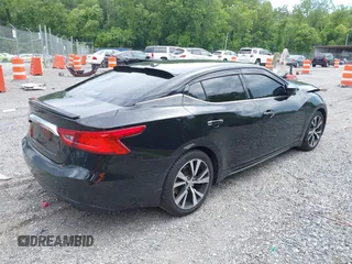 2017 Nissan Maxima SL with VIN 1N4AA6AP9HC385851, listed as a IAAI auction lot 42486634 with 98,599 mi miles and . Bid and sale history available at DreamBid. Image 4.