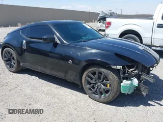 2019 Nissan 370Z Sport Touring with VIN JN1AZ4EH1KM420719, listed as a IAAI auction lot 42096816 with 97,803 mi miles and . Bid and sale history available at DreamBid. Image 1.