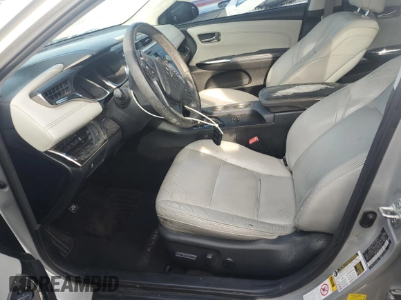 2013 Toyota Avalon XLE with VIN 4T1BK1EB6DU037938, listed as a Copart auction lot 62709525 with 104,616 mi miles and Salvage title. Bid and sale history available at DreamBid. Image 7.