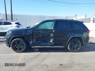 2018 Jeep Grand Cherokee Laredo E with VIN 1C4RJFAG4JC367924, listed as a IAAI auction lot 42065114 with 65,250 mi miles. Bid and sale history available at carsss.com. Image 14.