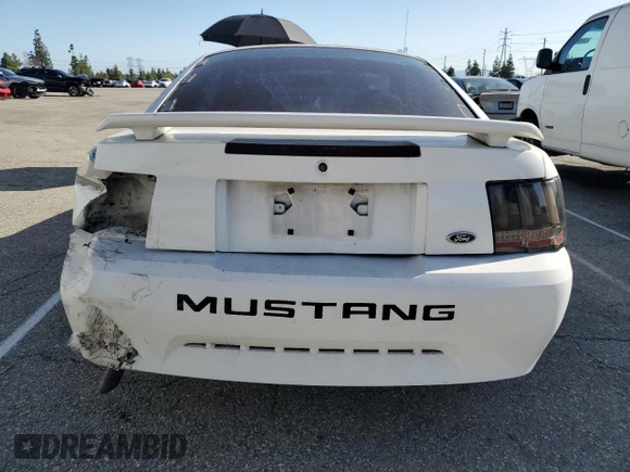2004 Ford Mustang Standard with VIN 1FAFP404X4F105539, listed as a Copart auction lot 49404775 with 134,870 mi miles and Salvage Title. Bid and sale history available at carsss.com. Image 6.