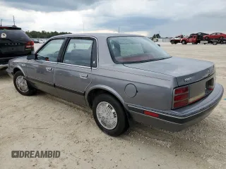 1992 Oldsmobile Cutlass z VIN 1G3AL54N4N6438104, wystawiony jako Copart lot #74415204 z przebiegiem 118 459 mil mil oraz Szkody całkowita. Historia ofert i sprzedaży dostępna na DreamBid. Obrazek 2.