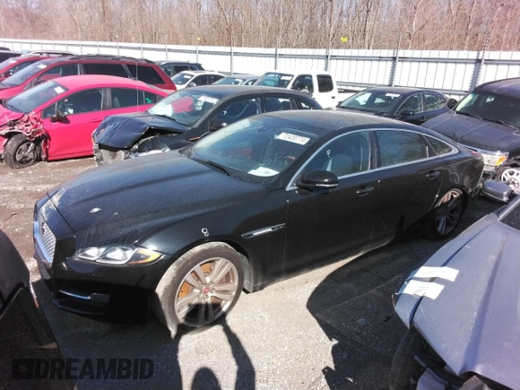 2016 Jaguar XJ Portfolio with VIN SAJWJ2GD8G8V92997, listed as a Copart auction lot 72420774 with 74,934 mi miles and Salvage title. Bid and sale history available at DreamBid. Image 1.