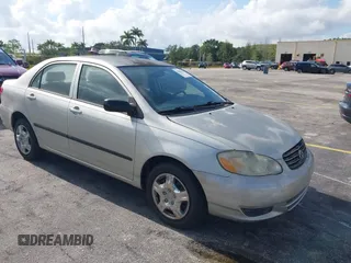 2003 Toyota Corolla CE with VIN JTDBR32E130010551, listed as a IAAI auction lot 42204515 with 129,759 mi miles. Bid and sale history available at carsss.com. Image 1.