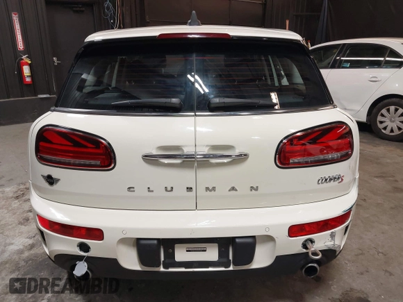 2023 MINI Clubman Cooper S with VIN WMWXJ1C02P2S77645, listed as a IAAI auction lot 41300674 with 34,302 mi miles. Bid and sale history available at carsss.com. Image 16.