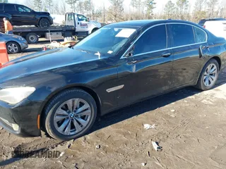 2011 BMW 7 Series 740i with VIN WBAKA4C58BC392020, listed as a IAAI auction lot 41314751 with 116,553 mi miles. Bid and sale history available at carsss.com. Image 6.